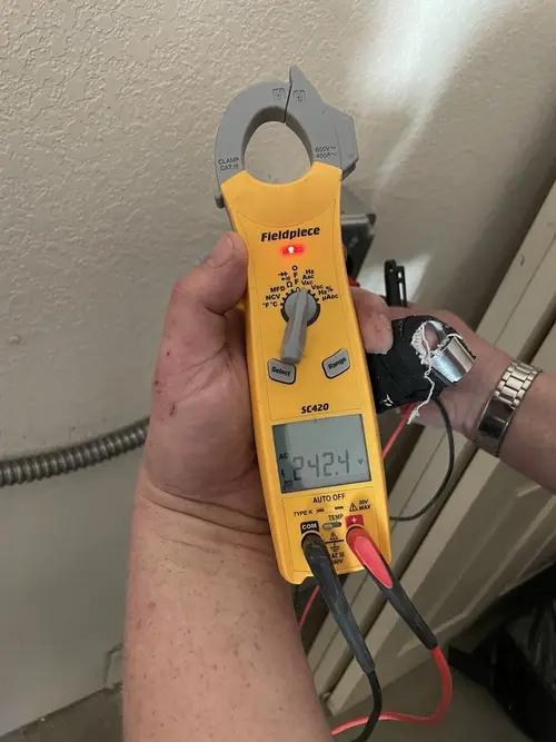 Voltage testing with clamp meter during Ceiling Fan Installation in Little Egg Harbor